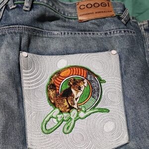 COOGI Denim with Vibrant Embroidered Pocket